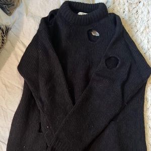 Incredible sweater with details that lend it to be styled uniquely.